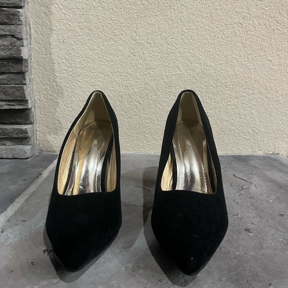 Heels with rhinestone detailing in the back of the heel